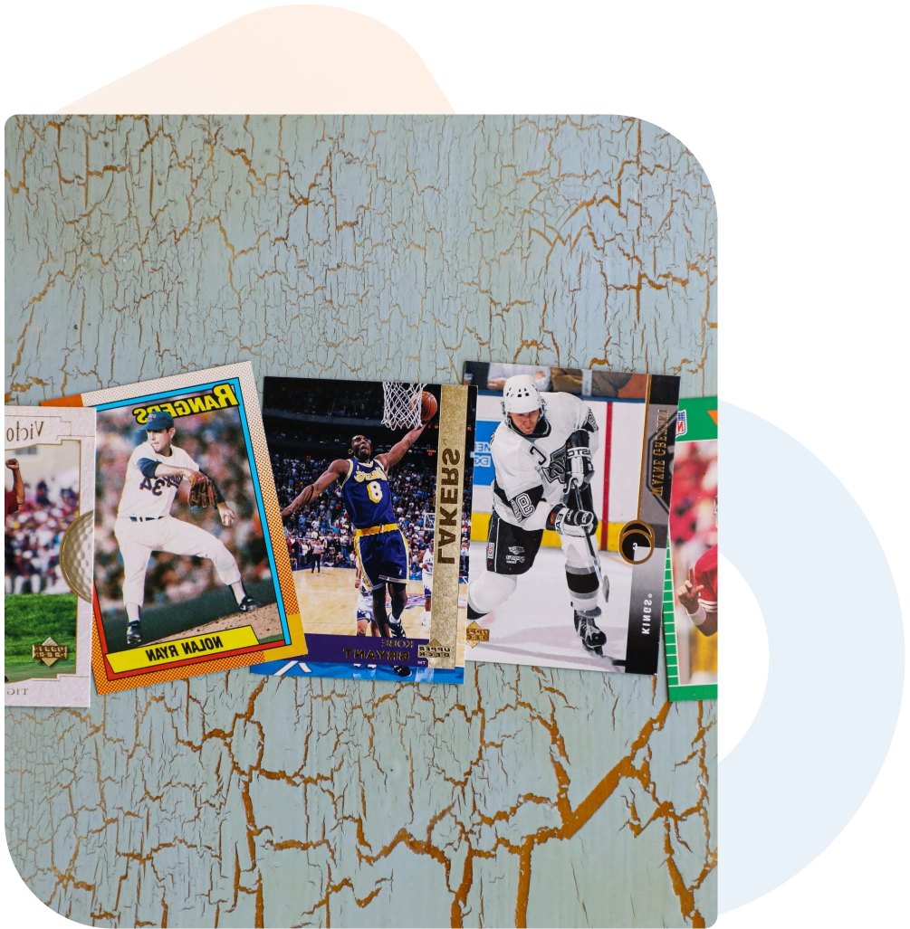 Sports trading cards on distressed background.