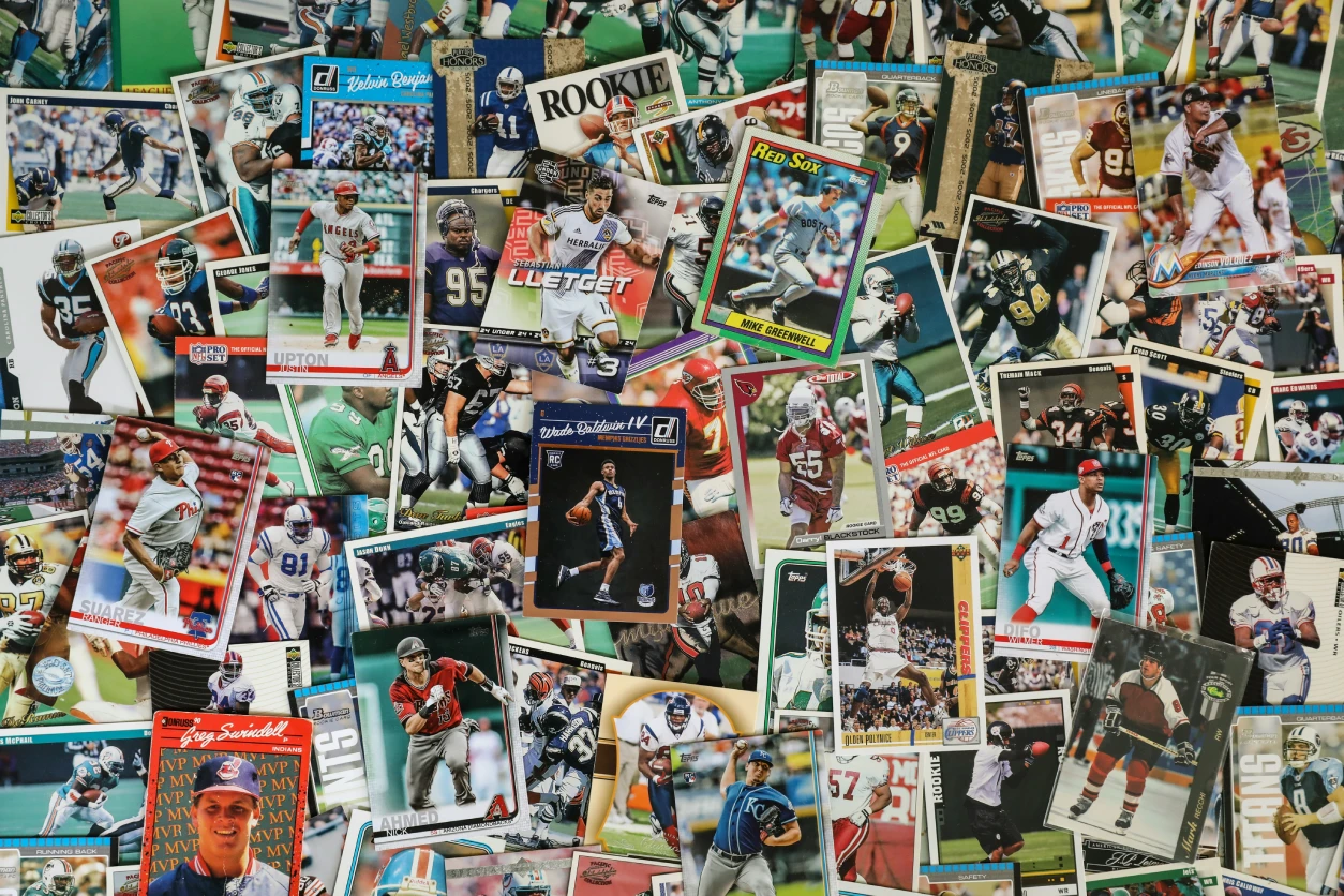 Pile of vintage sports trading cards.